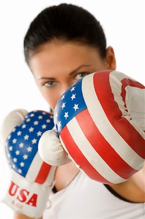 simsearch:400-04970057,k - brunette with usa flag boxing gloves punching against camera Stock Photo - Budget Royalty-Free & Subscription, Code: 400-04553875
