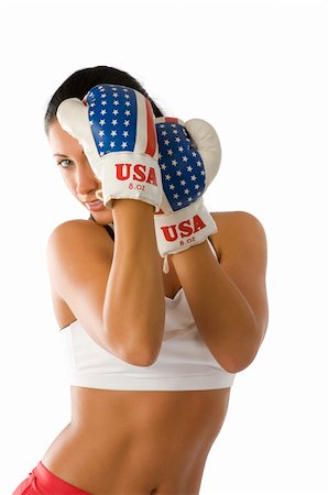 simsearch:400-04970057,k - cute girl with boxing gloves keep up the guard on her face Stock Photo - Budget Royalty-Free & Subscription, Code: 400-04553878