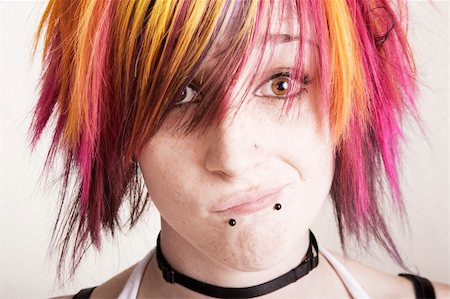 simsearch:400-04016564,k - Close-Up of a Punk Girl with Brightly Colored Hair Stock Photo - Budget Royalty-Free & Subscription, Code: 400-04566123