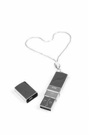 Flash drive, chrome, chain Stock Photo - Budget Royalty-Free & Subscription, Code: 400-04566448