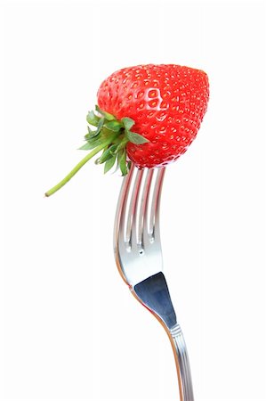 simsearch:400-05370991,k - Close-up of a strawberry and a fork isolated on a white background Stock Photo - Budget Royalty-Free & Subscription, Code: 400-04560699