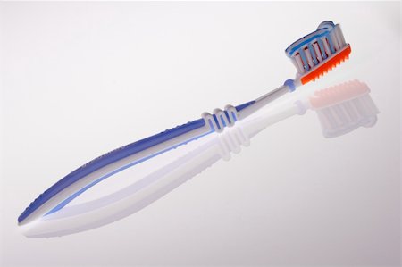 simsearch:400-04151135,k - Toothbrush with toothpaste Stock Photo - Budget Royalty-Free & Subscription, Code: 400-04563676