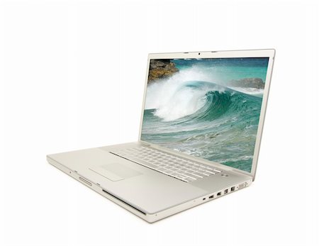 simsearch:400-05209527,k - Laptop Isolated on White with my Surf Photo on screen. Stock Photo - Budget Royalty-Free & Subscription, Code: 400-04574321