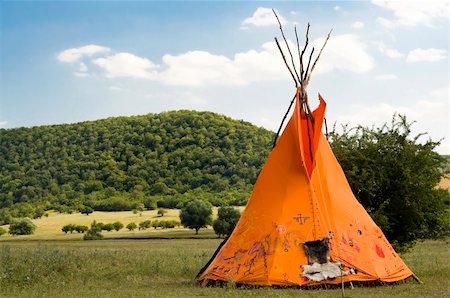 indian ethnic domicile, teepee AKA wigwam on the meadow Stock Photo - Budget Royalty-Free & Subscription, Code: 400-04574514