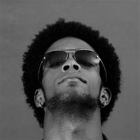 simsearch:400-04163139,k - Portrait of young african man wearing sunglasses in black and white Stock Photo - Budget Royalty-Free & Subscription, Code: 400-04574563