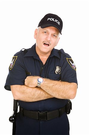 Police officer with his arms folded and an amazed expression.  Isolated on white. Stock Photo - Budget Royalty-Free & Subscription, Code: 400-04574819
