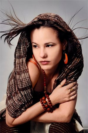 simsearch:400-05678958,k - Portrait of young fashion woman with brown accessories and scarf Photographie de stock - Aubaine LD & Abonnement, Code: 400-04575261