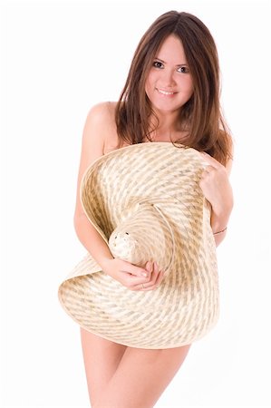 simsearch:400-07421488,k - Sexy girl. Being covered with the big hat. Isolated on white background Stock Photo - Budget Royalty-Free & Subscription, Code: 400-04576747