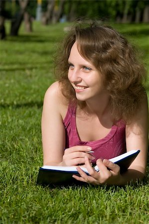 simsearch:400-04416781,k - Happy student with notebook. Photographie de stock - Aubaine LD & Abonnement, Code: 400-04572790