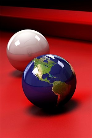 simsearch:400-06089187,k - Earth (showing North, Central and South America) in the form of a pool ball on a red pool table - shallow depth of field Stock Photo - Budget Royalty-Free & Subscription, Code: 400-04572990