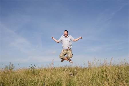 simsearch:400-03934248,k - happy man relaxing on meadow Stock Photo - Budget Royalty-Free & Subscription, Code: 400-04573432