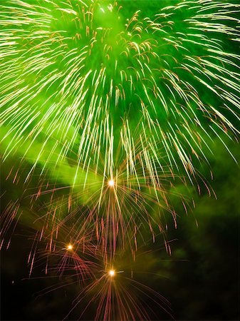 simsearch:400-04573554,k - Fireworks rockets exploding against dark sky. Stock Photo - Budget Royalty-Free & Subscription, Code: 400-04573537