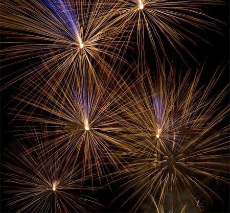 simsearch:400-04573554,k - Fireworks rockets exploding against dark sky. Stock Photo - Budget Royalty-Free & Subscription, Code: 400-04573554