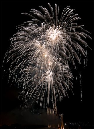 simsearch:400-04573554,k - Fireworks rockets exploding against dark sky. Stock Photo - Budget Royalty-Free & Subscription, Code: 400-04573552