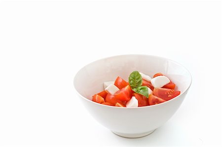 simsearch:700-01099893,k - italian salad made with cherry tomatoes, Mozzarela chees, and fresh basil. Isolated on white Stock Photo - Budget Royalty-Free & Subscription, Code: 400-04573590