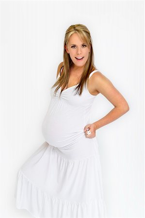 simsearch:400-05716366,k - Pregnant girl holding her belly Stock Photo - Budget Royalty-Free & Subscription, Code: 400-04585661
