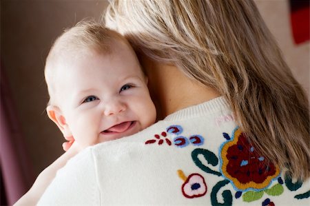 simsearch:400-05153083,k - happy child on the shoulder of his mom Stock Photo - Budget Royalty-Free & Subscription, Code: 400-04585755