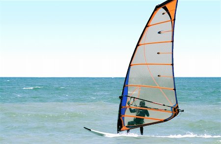 simsearch:400-03992760,k - Windsurfer on the sea in the afternoon Stock Photo - Budget Royalty-Free & Subscription, Code: 400-04587773