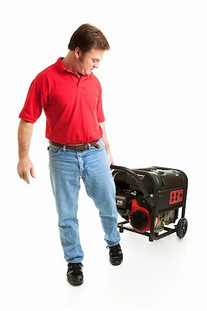 rolling shoes - Man pulling a portable electric generator behind him.  Full body isolated. Stock Photo - Budget Royalty-Free & Subscription, Code: 400-04589123