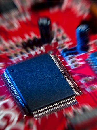 simsearch:400-05331614,k - Zoom in on red computer circuit board with memory chip. Stock Photo - Budget Royalty-Free & Subscription, Code: 400-04595990
