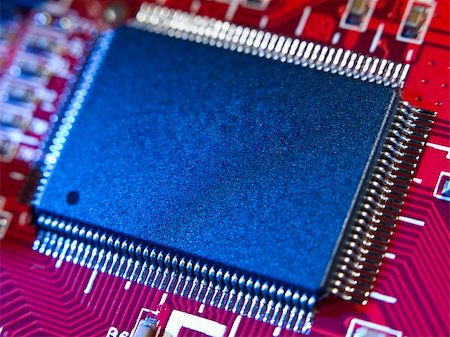 simsearch:400-05269277,k - Close up on a memory chip in a red computer circuit board. Foto de stock - Super Valor sin royalties y Suscripción, Código: 400-04595991