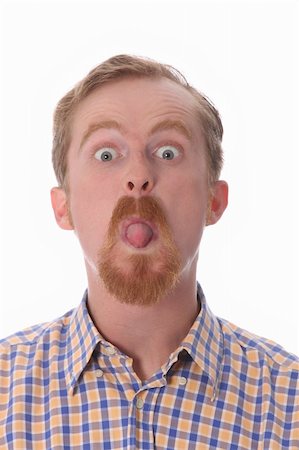 sticking out her tongue - Portrait of man showing his tongue Stock Photo - Budget Royalty-Free & Subscription, Code: 400-04596771