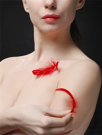 Young topless woman holding a plume Photographie de stock - Aubaine LD & Abonnement, Code: 400-04598240
