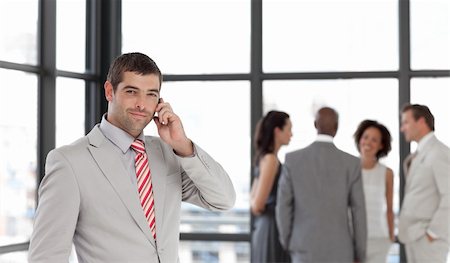 simsearch:400-05145011,k - Potrait of a Businessman taking on the phone Stock Photo - Budget Royalty-Free & Subscription, Code: 400-04598678