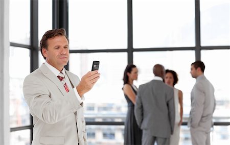 simsearch:400-05145011,k - Potrait of a Senior business man on phone Stock Photo - Budget Royalty-Free & Subscription, Code: 400-04598702