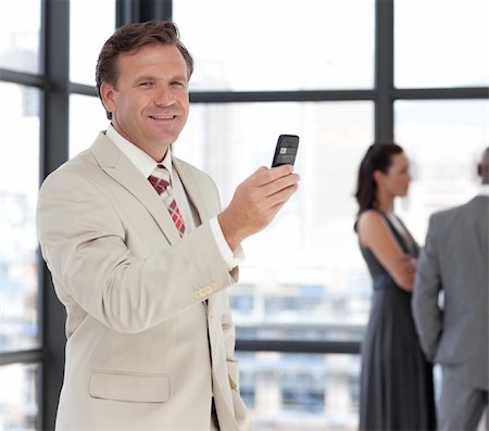 simsearch:400-05145011,k - Potrait of a Senior business man on phone Stock Photo - Budget Royalty-Free & Subscription, Code: 400-04598703