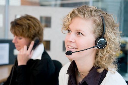 simsearch:400-05287143,k - Receptionist or frontdesk workers in an office. Stock Photo - Budget Royalty-Free & Subscription, Code: 400-04599317