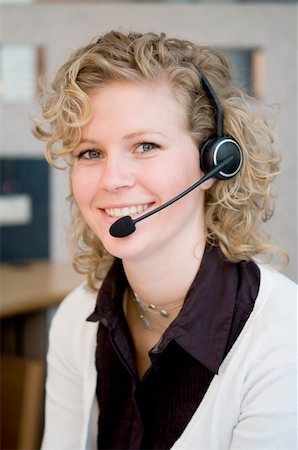 simsearch:400-05287143,k - Receptionist or frontdesk worker in an office. Stock Photo - Budget Royalty-Free & Subscription, Code: 400-04599322