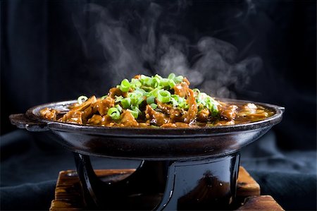 hot chinese cooking food with steam Stock Photo - Budget Royalty-Free & Subscription, Code: 400-04599711