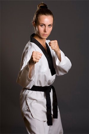 simsearch:400-05908874,k - girl in white kimono ready to fight Stock Photo - Budget Royalty-Free & Subscription, Code: 400-04599864