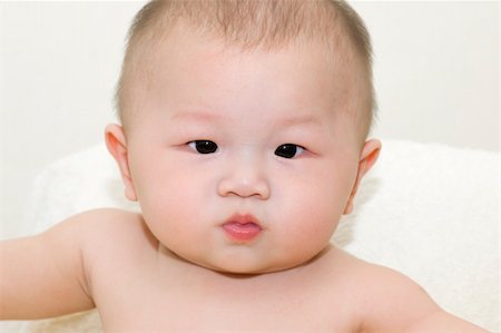simsearch:400-07171482,k - Horizontal portrait of a adorable 6-month-old Asian baby boy Stock Photo - Budget Royalty-Free & Subscription, Code: 400-04590950
