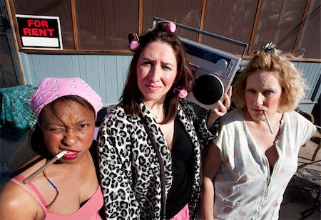 simsearch:400-04099373,k - Portrait of three trashy women outdoors Stock Photo - Budget Royalty-Free & Subscription, Code: 400-04591309