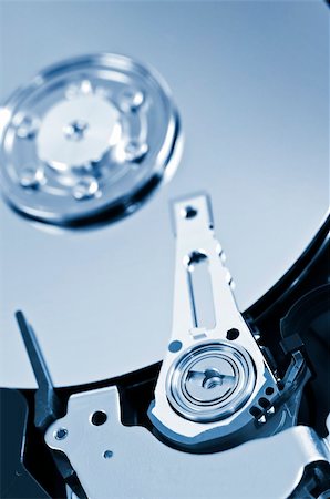 simsearch:400-05238336,k - Closeup of hard disk drive internal components Stock Photo - Budget Royalty-Free & Subscription, Code: 400-04605492