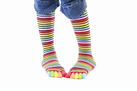 stocking feet - woman legs in strip sock on white background Stock Photo - Budget Royalty-Free & Subscription, Code: 400-04606080