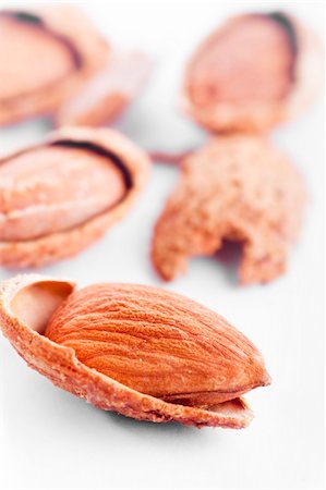 simsearch:400-04833195,k - Close up almond nuts, focus on foreground and shallow depth of field. Stock Photo - Budget Royalty-Free & Subscription, Code: 400-04607559