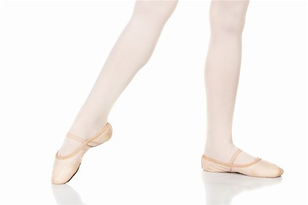 simsearch:400-04119672,k - Young female ballet dancer showing various classic ballet feet positions on a white background - Point a la 2nd. NOT ISOLATED Stock Photo - Budget Royalty-Free & Subscription, Code: 400-04609434