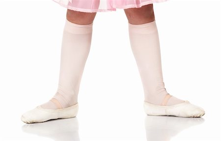 Young female ballet dancer showing various classic ballet feet positions on a white background - Beginner 2nd position. NOT ISOLATED Stock Photo - Budget Royalty-Free & Subscription, Code: 400-04609431