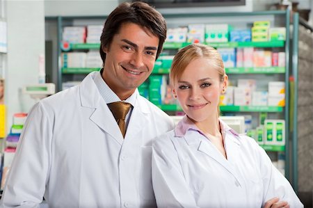 simsearch:400-04106195,k - portrait of two pharmacists looking at camera and smiling Stock Photo - Budget Royalty-Free & Subscription, Code: 400-04601935