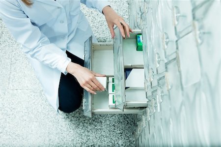 simsearch:400-04106195,k - high angle view of pharmacist taking medicine from drawer. Copy space Stock Photo - Budget Royalty-Free & Subscription, Code: 400-04601943