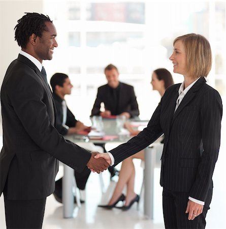 simsearch:400-04609965,k - Business people shaking hands in agreement Stock Photo - Budget Royalty-Free & Subscription, Code: 400-04602770