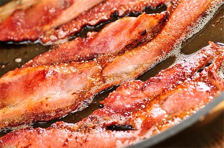 simsearch:400-04885499,k - Bacon strips sizzling on a frying pan Stock Photo - Budget Royalty-Free & Subscription, Code: 400-04603500