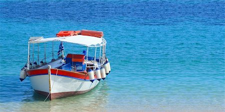 simsearch:400-05254289,k - Fishing boat in the Ionian sea in Greece Stock Photo - Budget Royalty-Free & Subscription, Code: 400-04614175