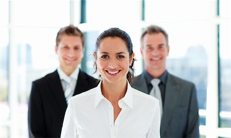 Portrait of a smiling businesswoman with her team Stock Photo - Budget Royalty-Free & Subscription, Code: 400-04614497