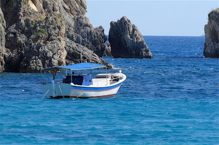 simsearch:400-05254289,k - Fishing boat in the Ionian sea Greece Stock Photo - Budget Royalty-Free & Subscription, Code: 400-04614748