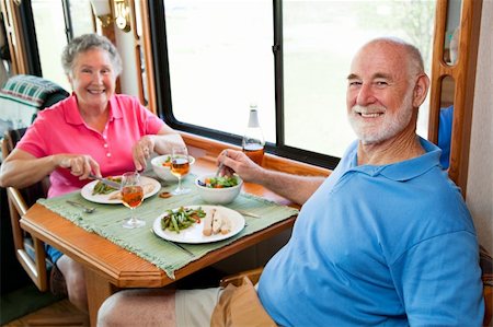 simsearch:400-04208630,k - Senior couple enjoying a romantic dinner in their motor home.  Focus on husband in foreground. Stock Photo - Budget Royalty-Free & Subscription, Code: 400-04618009