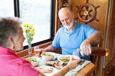 simsearch:400-04208630,k - Senior couple having romantic dinner in their motor home. Stock Photo - Budget Royalty-Free & Subscription, Code: 400-04618011